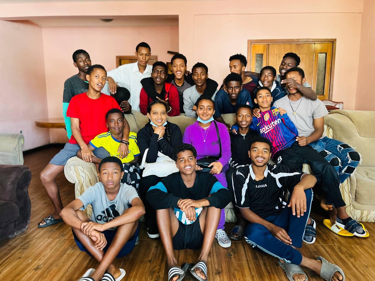 TYC members smiling together